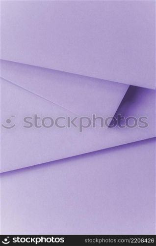 overhead view purple paper textured background