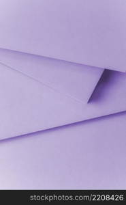 overhead view purple paper textured background