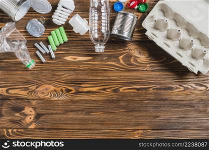 overhead view recycle items brown wooden background