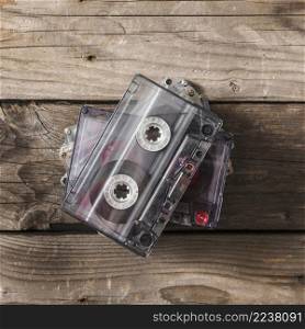 overhead view transparent cassette tape wooden table