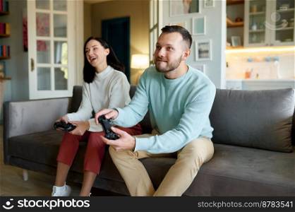 Overjoyed family are playing video games at home. Overjoyed family playing video games