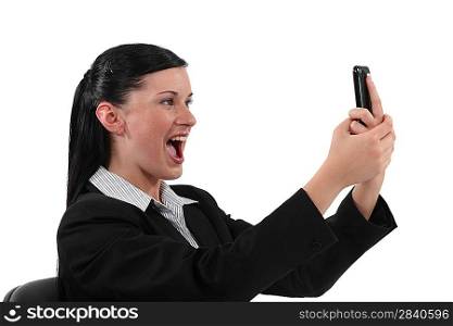 Overjoyed woman reading text message
