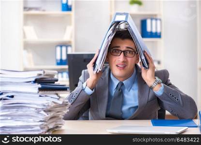 Overloaded with work employee under paperwork burden