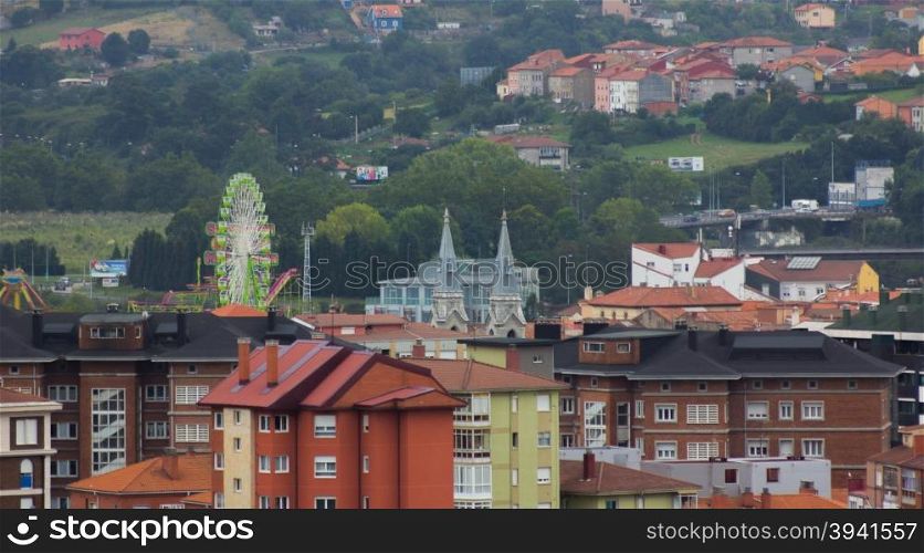 Overview and ferris wheel in the city of Aviles, Spain