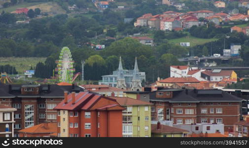 Overview and ferris wheel in the city of Aviles, Spain