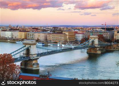 Overview of Budapest with the Szechenyi Chain Bridge in Budapest at sunset