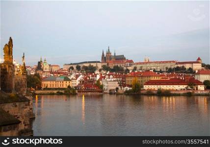 Overview of old Prague from Charles bridge ar sunrise