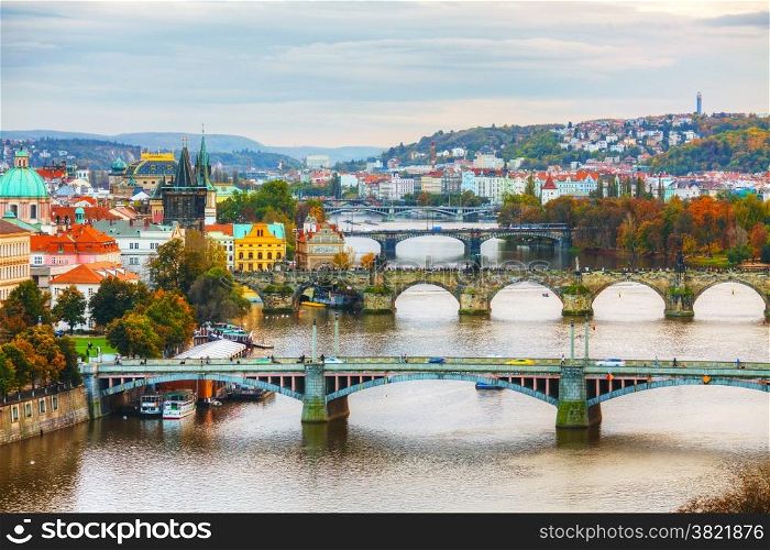 Overview of old Prague with Charles bridge at sunset