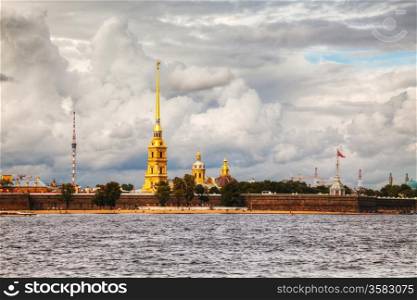 Overview of Saint Peter and Paul fortress in St. Petersburg, Russia on a cloudy day