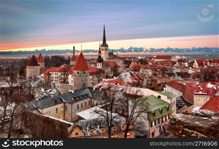 Overview of Tallinn in Estonia taken from the overlook in Toompea showing the town walls and churches. Taken in HDR to enhance the sunset