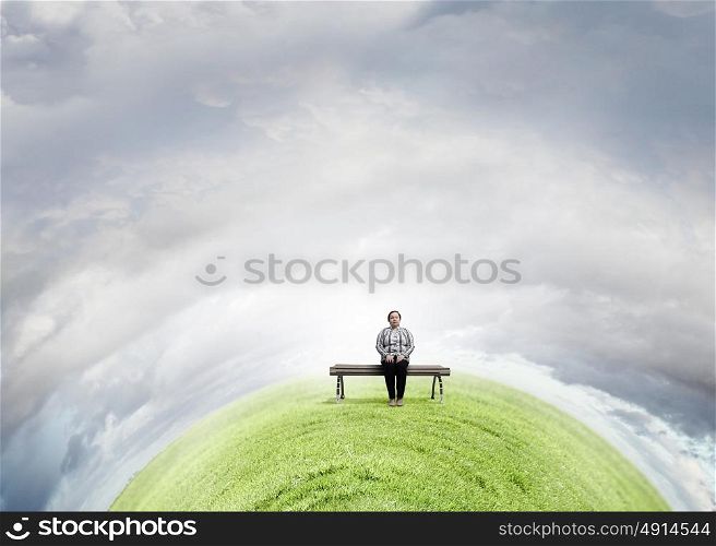 Overweight problem. Middle aged stout woman sitting on bench