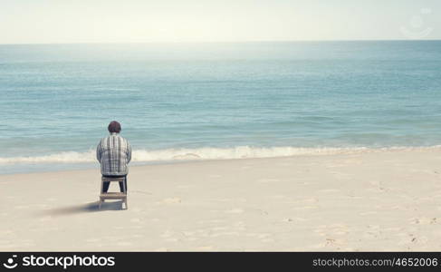 Overweight problem. Middle aged stout woman sitting with back