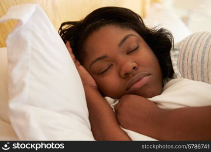 Overweight Woman Asleep In Bed