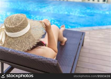 Overweight young woman orange swimsuit and straw beach sun hat relaxing in pool Happy plus size woman body positive Vacation Traveling in summer