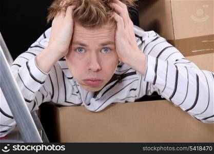Overwhelmed man on moving day