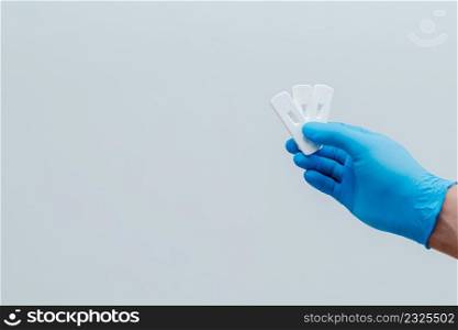 Own hand showing Covid-19 negative test result with SARS CoV-2 Rapid antigen test kit
