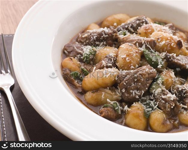 Oxtail Braised in Red Wine with Basil Gnocchi and Parmesan Cheese