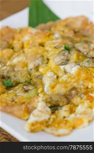 Oyster Omelette. Southeast Asian Fried Baby Oyster Omelette on dish
