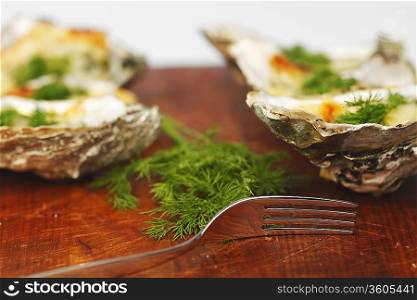 Oysters under cheese and dill