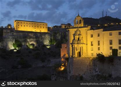 Pablo Convent (foreground) and the Carmelitas Convent high on the cliffs in the city of Cuenca in the La Macha region of central Spain.