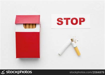 pack cigarettes with message stop smoking