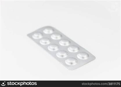 Pack of medicine isolated on white background, stock photo