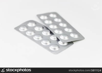 Pack of medicines isolated on white background, stock photo