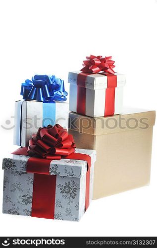 packed gifts stand on white surface