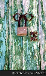 padlock spain brass knocker lanzarote abstract door wood in the green