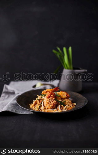 Padthai noodles with shrimps and vegetables.