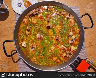 Paella from Spain recipe process boiling broth step by step