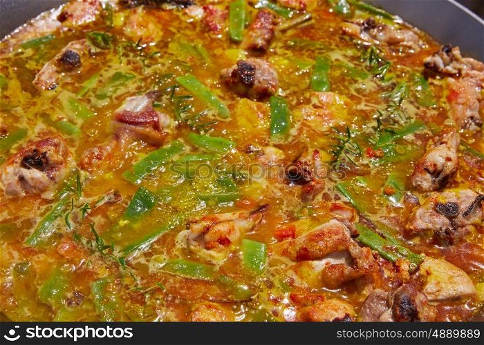 Paella from Spain recipe process boiling broth step by step