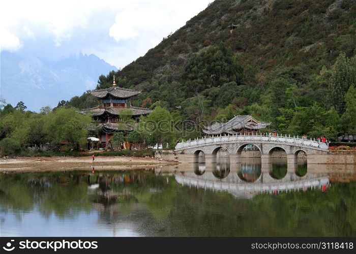 Pagoda and bridge in Black Dragon park in Lijiang, China