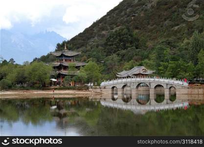 Pagoda and bridge in Black Dragon park in Lijiang, China