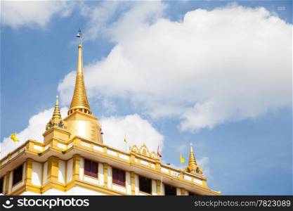 Pagoda in a temple on top attractions of Thailand. Partly sunny in the day.