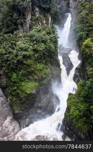 Pailon del Diablo - Mountain river and waterfall in the Andes. Banos. Ecuador