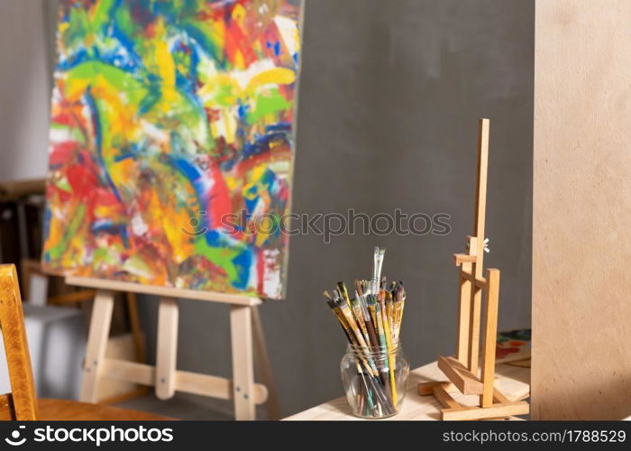 Paint brush and oil painting. Art still life and paintbrush painting in artist creative studio with painter tool
