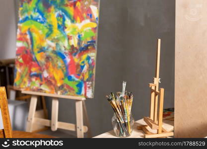 Paint brush and oil painting. Art still life and paintbrush painting in artist creative studio with painter tool