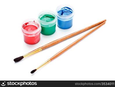 paint cans and brushes isolated on white background