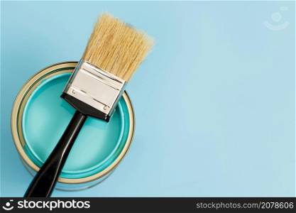 Paint cans and paint brushes and how to choose the perfect interior paint color and good for health
