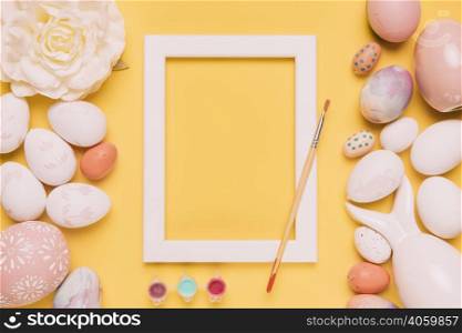 paint color paintbrush white border frame rose easter eggs yellow backdrop