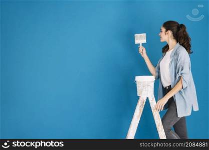 paint concept with woman ladder