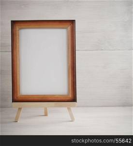 paint frame on wooden background