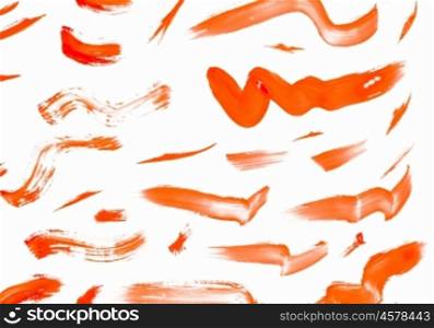 Paint smears. Abstract smears of orange paint on white background