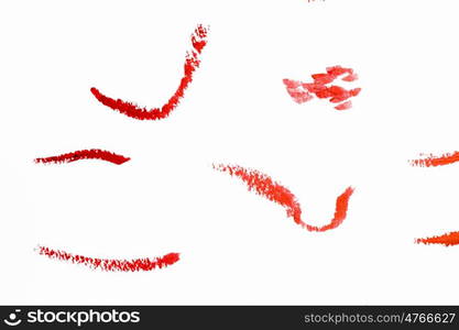 Paint smears. Abstract smears of orange paint on white background