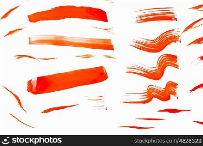 Paint smears. Abstract smears of orange paint on white background