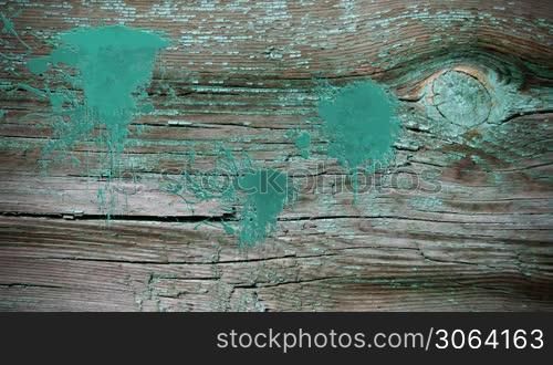 Paint splatters over old wood
