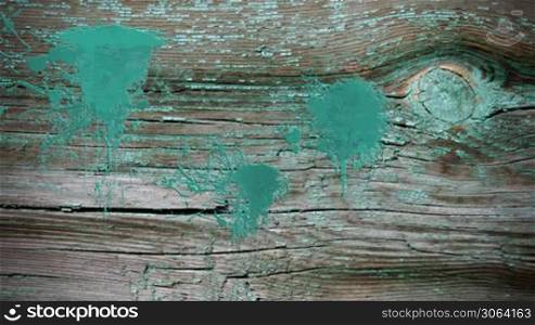 Paint splatters over old wood