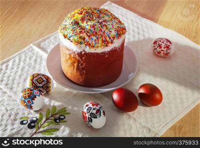 Painted Colorful Easter Eggs and rich bread