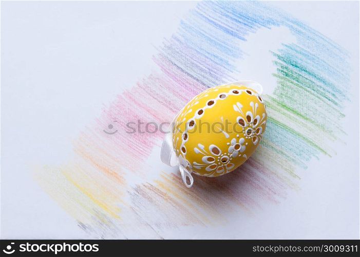 painted easter egg with cut out patterns